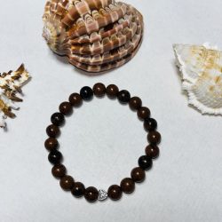 Mahagóni obszidián karkötő fémdísszel